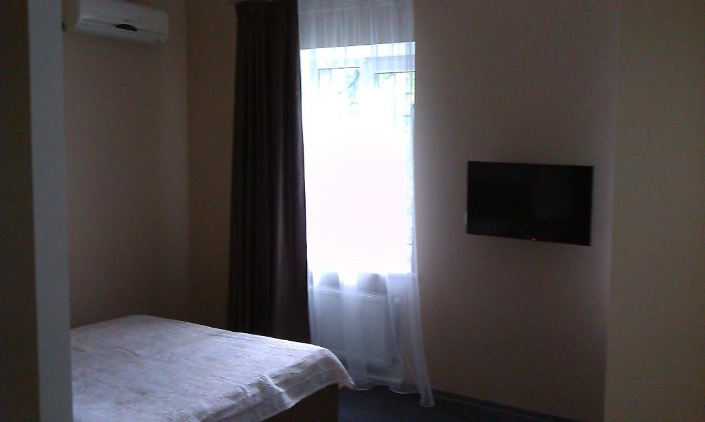 Yuzhniy Dvorik Aparthotel Odessa Quarto foto